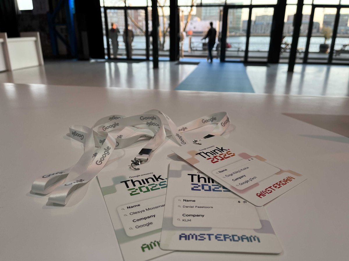 Printed attendee badges and lanyards at Google Think 2025, Amsterdam